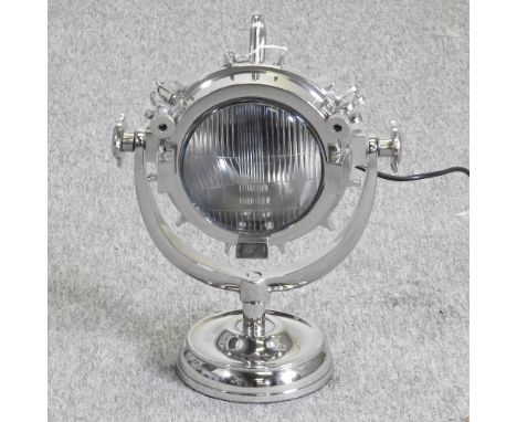 A modern chromed table spotlight lamp