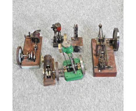 A mid 20th century model beam engine, together with four others