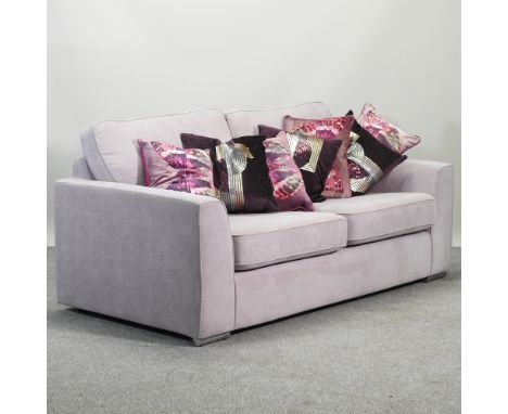 A contemporary pink upholstered sofa, 192cm, with loose cushions