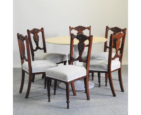 A set of six Edwardian inlaid dining chairs, together with a modern light oak circular dining table on a painted metal base, 