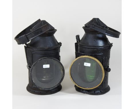 A metal railway lantern, together with another, 37cm high