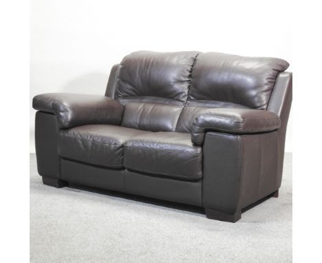 A modern brown leather upholstered sofa, 170cm, together with another, an armchair and an ottoman (4)