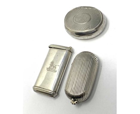 THREE VICTORIAN SILVER VESTA CASES, H.W. & L. DEE, LONDON, 18 one oval box form, engine-turned around a monogrammed oval, the