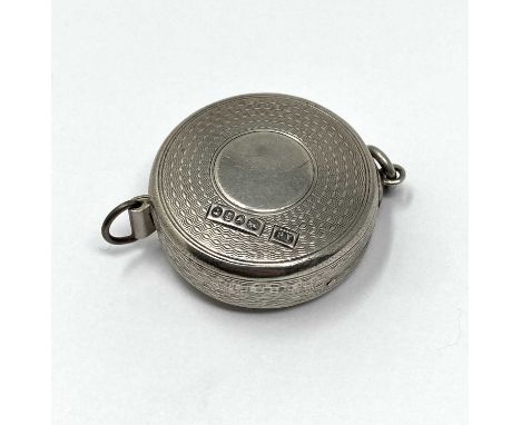 A VICTORIAN SILVER TAPE MEASURE, THOMAS JOHNSON, LONDON, 1862 the circular body with concentric engine-turning, a vacant roun