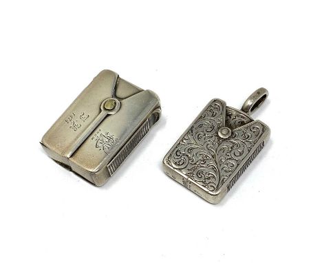 TWO VICTORIAN SILVER VESTA CASES, BOTH BIRMINGHAM both oblong 'clip' form and with strike to side, one scroll foliate decorat