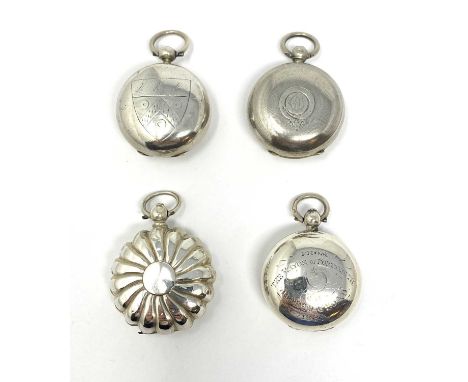 FOUR VICTORIAN SILVER SOVEREIGN CASES each of typical circular form: one with lobes around roundels, one roundel with worn in