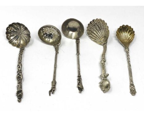A GROUP OF FOUR VICTORIAN SILVER DECORATIVE SPOONS, VARIOUS MAKERS, ALL LONDON, 1845-74 comprising a sugar spoon and three si