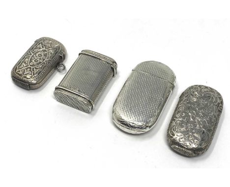 FOUR VICTORIAN SILVER VESTA CASES, DEAKIN & MOORE, BIRMINGHAM, 1865-1877 all sprung top opening and strikes to base: one roun