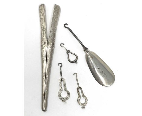 A PAIR OF VICTORIAN SILVER GLOVE STRETCHERS AND A PATENT SHOE HORN BUTTON HOOK, BOTH LONDON, 1880 /83 RESPECTIVELY the glove 
