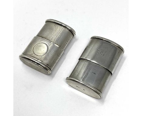 TWO VICTORIAN SILVER VESTA CASES, H.W. & L. DEE, LONDON, 1868 / 69 both of oval section and with sliding panel to cover the m