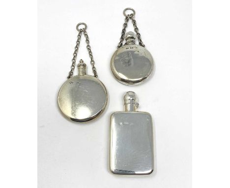 THREE VICTORIAN SILVER SCENT FLASKS, ALL LONDON one oblong, plain excepting an engraved D, bayonet fastening hinged cap, John