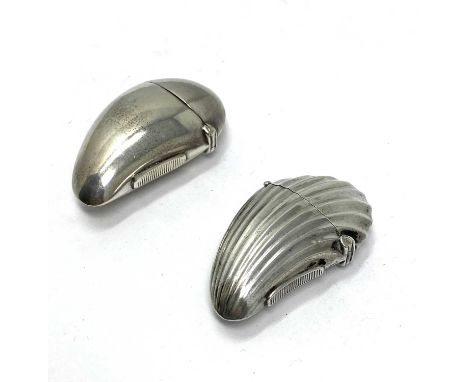TWO VICTORIAN SILVER 'TOOTH' VESTA CASES, MAKER'S MARKS INDECIPHERABLE, BIRMINGHAM, 1887 / 88 both hinged from the side above