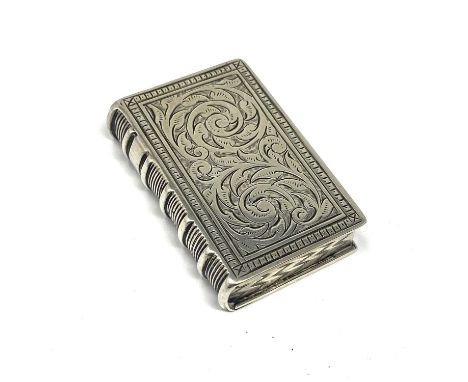 A VICTORIAN SILVER VESTA CASE, HILLIARD & THOMASON, BIRMINGHAM, 1882 realistically modelled as a book, with scroll foliate en