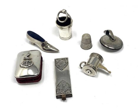 A GROUP OF VICTORIAN SILVER SEWING ACCOUTREMENTS, ALL LONDON comprising: a novelty tape measure, in the form of a reel with c