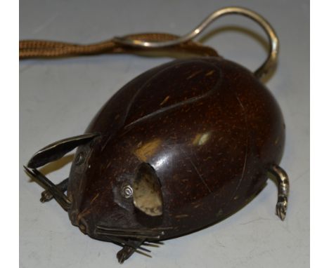 An unusual  automaton in the shape of a mouse made of a nut, with white metal features 