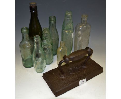 A late Victorian/early 20th century cast iron snooker table iron; various early 20th century bottles, including Cod bottles, 