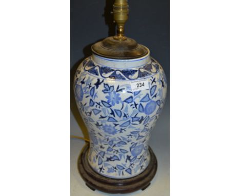 A blue and white table lamp, in the Oriental taste