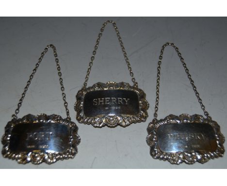 Three decanter labels