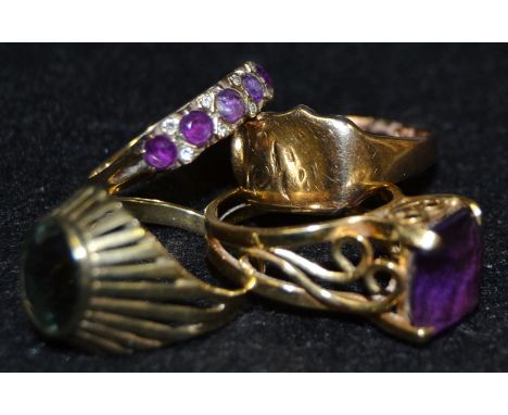 Rings - an amethyst line ring, 9ct gold shank;  others peridot, etc;  a 9ct gold signet ring, 20g gross (4)