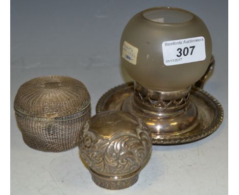 An 19th century silver plated and silver chamberstick, the base marked with an open palm stamp, with a silver collared froste