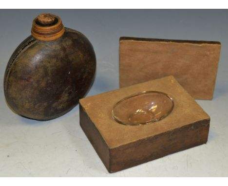 An early 19th century leather bound glass flask, bone collar, cork stopper; an unusual leather bound storage box holding a sm