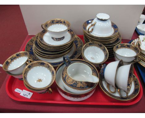 Noritake Tea Service, circa 1920s with gilt vine decoration to cobalt blue borders, forty pieces.Large service not every piec