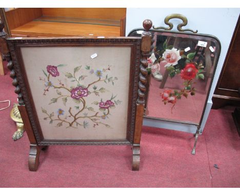 An Early XX Century Oak Firescreen, with tapestry panel; together with a brass firescreen with painted flowers on glass. (2)