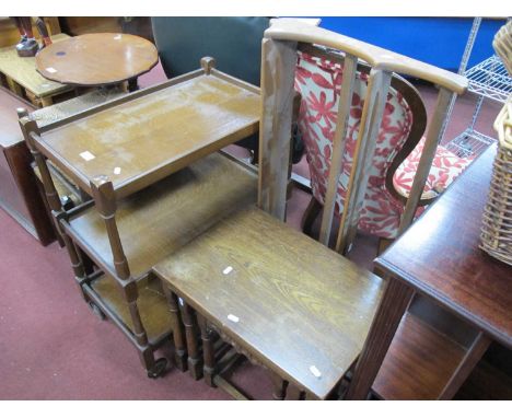 Oak Nest of Tables; together with a three-tier dinner trolley and an Ercol style wall rack. (3)