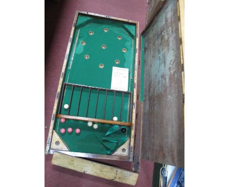 A vintage oak folding Bagatelle board With green baize to interior, approx. 212cm long when open.