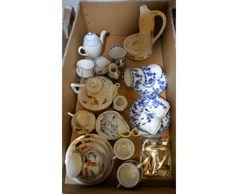 A Staffordshire Art Deco child's part tea set, printed with summer blossom and bluebirds in flight; a Royal Doulton Bunnykins