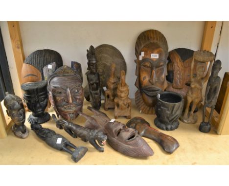 Tribal Art - a quantity of carved wooden masks, figures, vessels; etc 