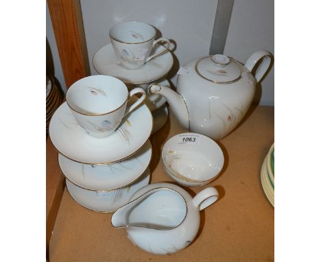 Ceramics - a KPM German porcelain tea service, comprising tea pot, six cups and saucers, cream jug, sugar bowl 