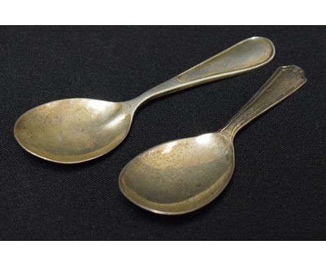 A George V silver caddy spoon, Birmingham 1921; another, Sheffield 1973 (2)