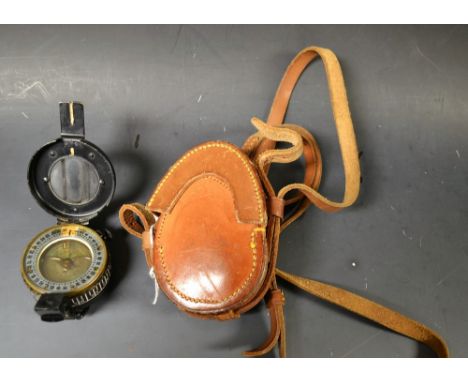 A TG Co. Ltd., London WWII marching compass, 1944 MKIII, leather cased