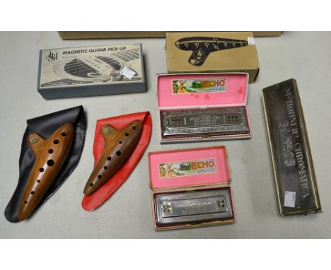 An M Hohner Chromatica mouth organ; two M Hohner Echo ; three Ocarina; a magnetic guitar pickup (7)