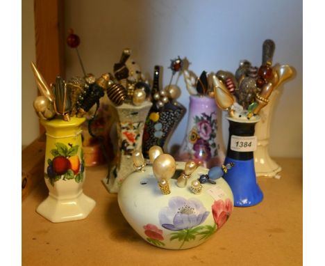 Lady's Accessories - a quantity of hat pins and ceramic hat pin stands