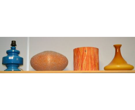 A 1960s Rotaflex compressed ovoid lamp shade, in bands of bright orange, the surface overlaid with clear plastic chipped glas