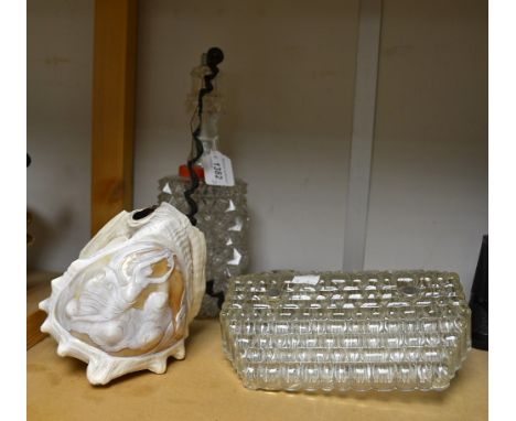 A carved conch shell cameo lamp; two other glass wall lamps