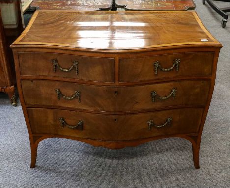 A French 19th century style cross banded and lnlaid mahogany commode of bombe form, with ribbon tide swag handles, 100cm by 5