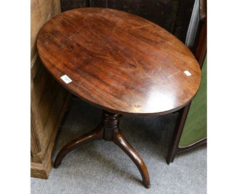 A 19th Century mahogany tilt top table, an Edwardian occasional table, a Magazine stand and a standard lamp (4)The tilt top t