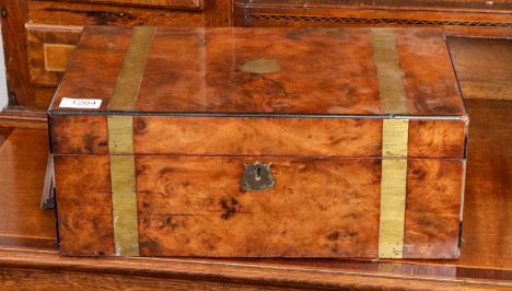 A 19th-century brass bound burr walnut writing slope; together with an early 20th-century oak desk top letter rack, the slope