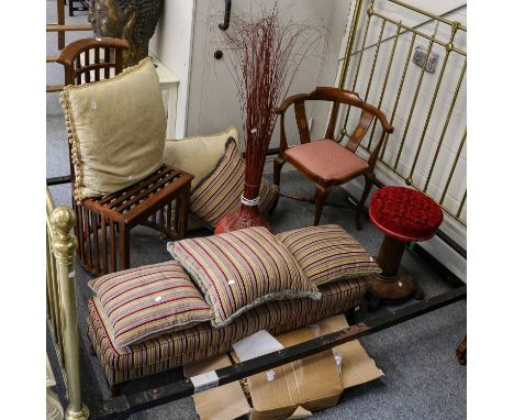 A 1920s mahogany framed footstool (later covered), four matching cushions, two further feather filled cushions in gold, three
