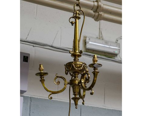 A gilt brass Adams revival three light ceiling pendant decorated with scrolls and swags, drop 59cm, approx 35cm wide