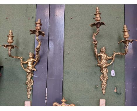 A pair of 19th-century style gilt metal twin light wall sconces of figural form, 59cm