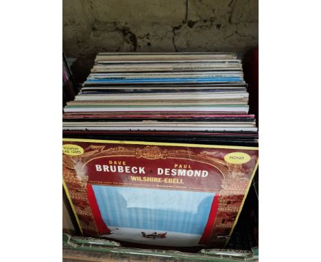 A box of over 70 assorted jazz lps to include Dave Brubeck, Horace Silver, Ray Charles, Ella Fitzgerald, Louis Armstrong, Bud