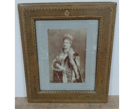 An autographed photographic portrait depicting Queen Margarethe of Italy, signed in the margin, gilt leather frame, 36cm x 41