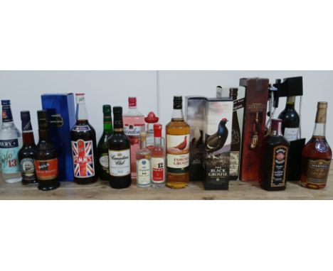 A mixed lot of alcoholic beverages including two bottles of Black Grouse whisky, 1ltr of Famous Grouse whisky, Gordon's pink 