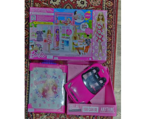 Three Barbie items; house set with Barbie doll, deluxe double doll carry case and a Barbie car.