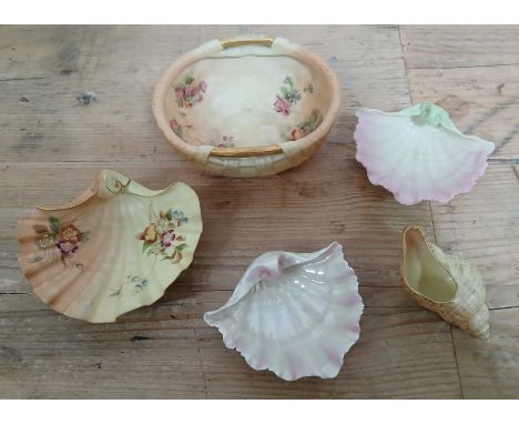 Five piecers of Royal Worcester comprising four shells and a basket. 