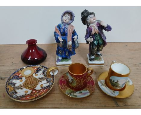 Assorted cabinet china comprising a pair of Volkstedt figures, a miniature Davenport camberstick, two Coalport miniature cups